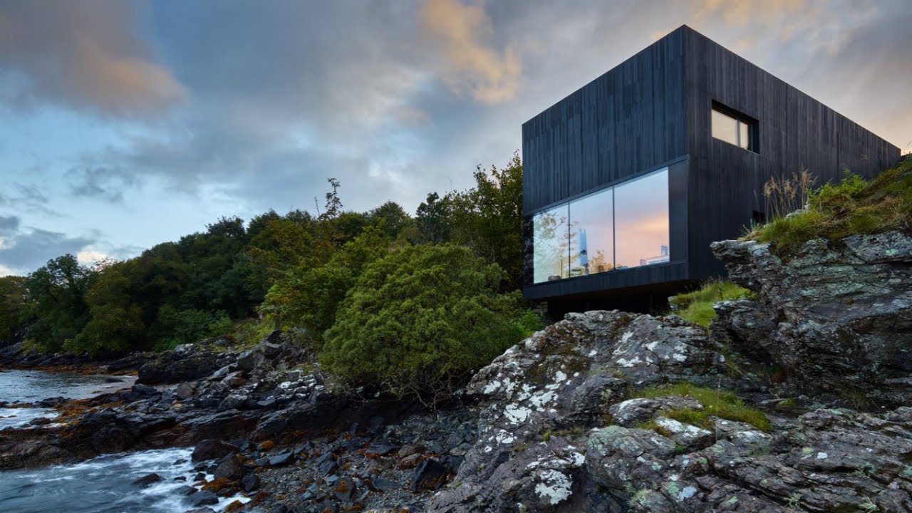 The Black House on the Isle of Skye balances modernity and vernacular architecture on a rocky coast.
