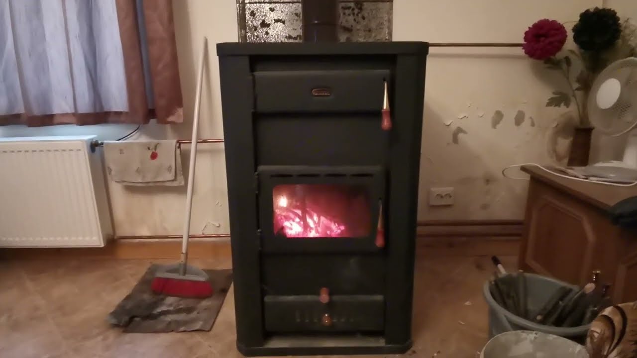 Отопление дома дровяным камином с водяным контуром + солнечный коллектор.
