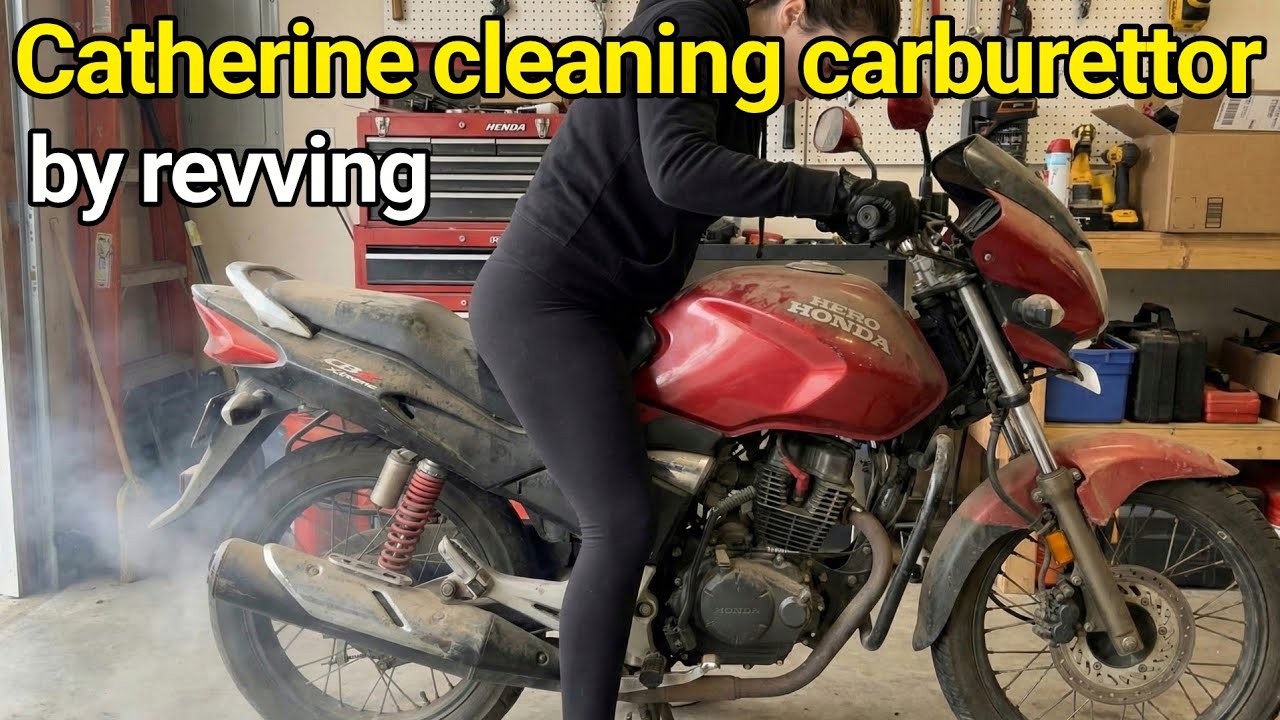 Catherine tries to clean the carburettor of the hero honda