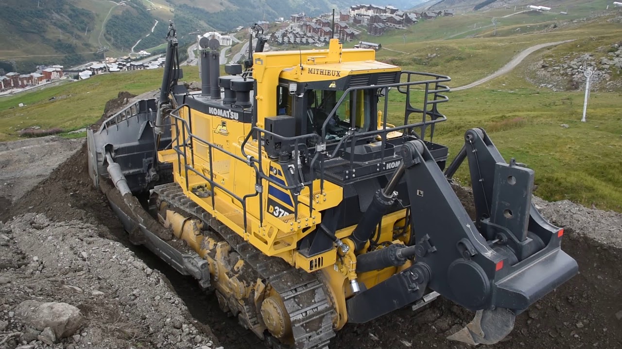 Komatsu D375A-8 pushing big blades