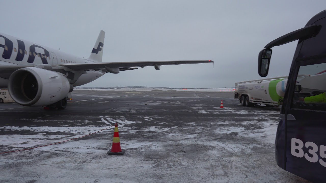 Finland, Helsinki, airport bus ride from gate to Finnair airplane + boarding