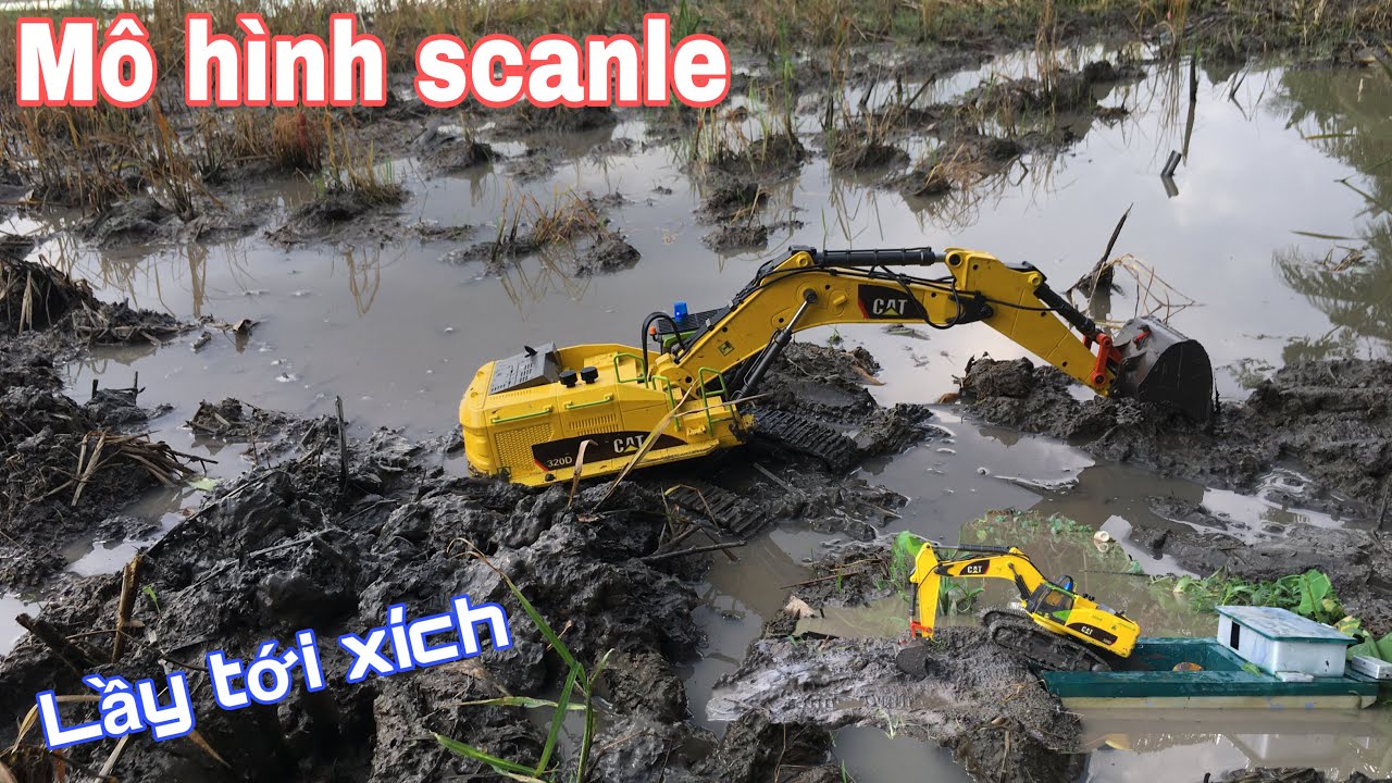 Máy xúc CAT320D lên phà đi múc đất,ngập lúc cả xích /scanle mini