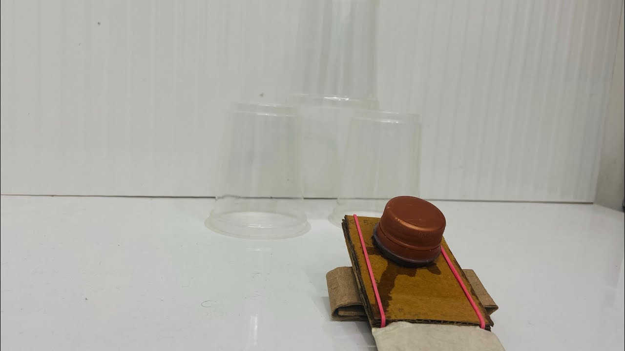 How to make a mechanical cardboard shooter at home