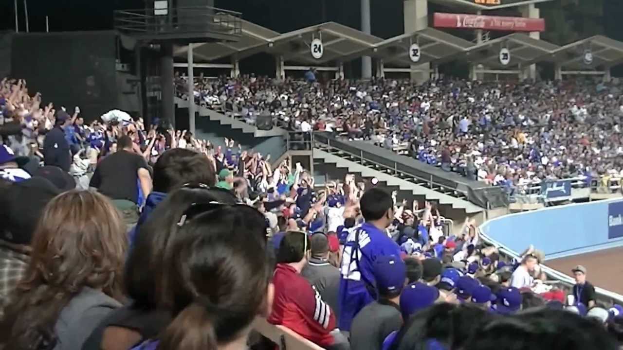 How does The Wave get started at a baseball game