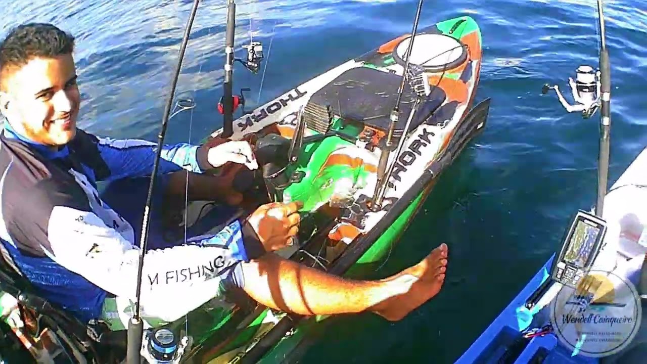 Pesca no porto da barra o molinete cantou e a vara envergou.