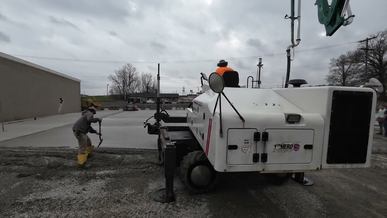 Pouring Concrete With Somero Laser Screed, Trying To Beat The Rain!
