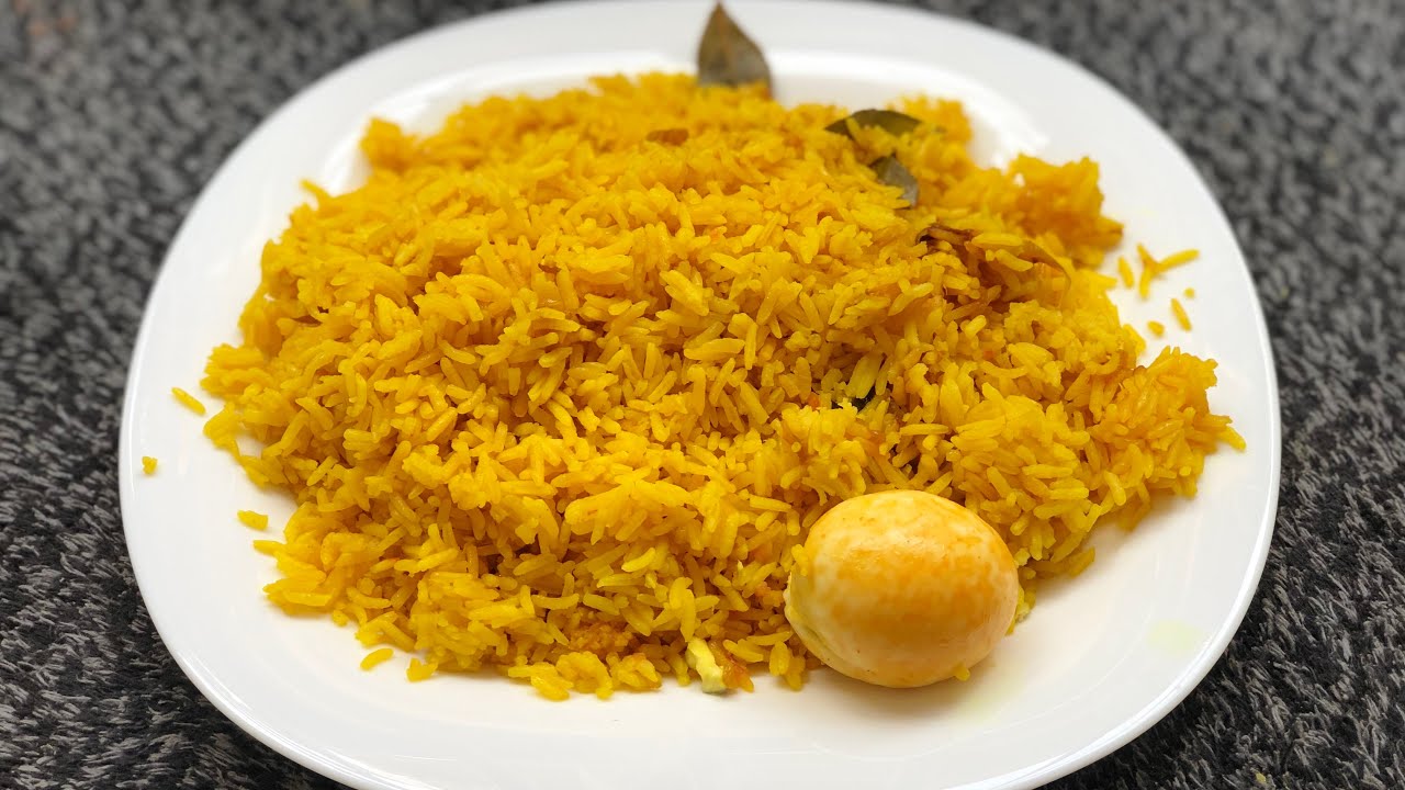 JINSI YAKUPIKA WALI WA MANJANO/HOW TO COOK TUMERIC RICE
