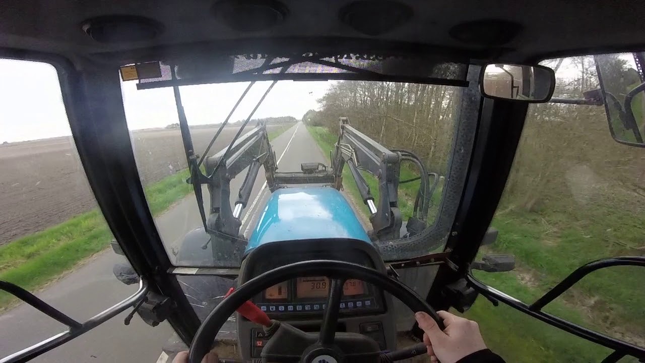 new holland 8260 on the road