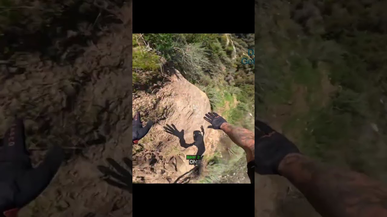 Biker falls off the side of a cliff!