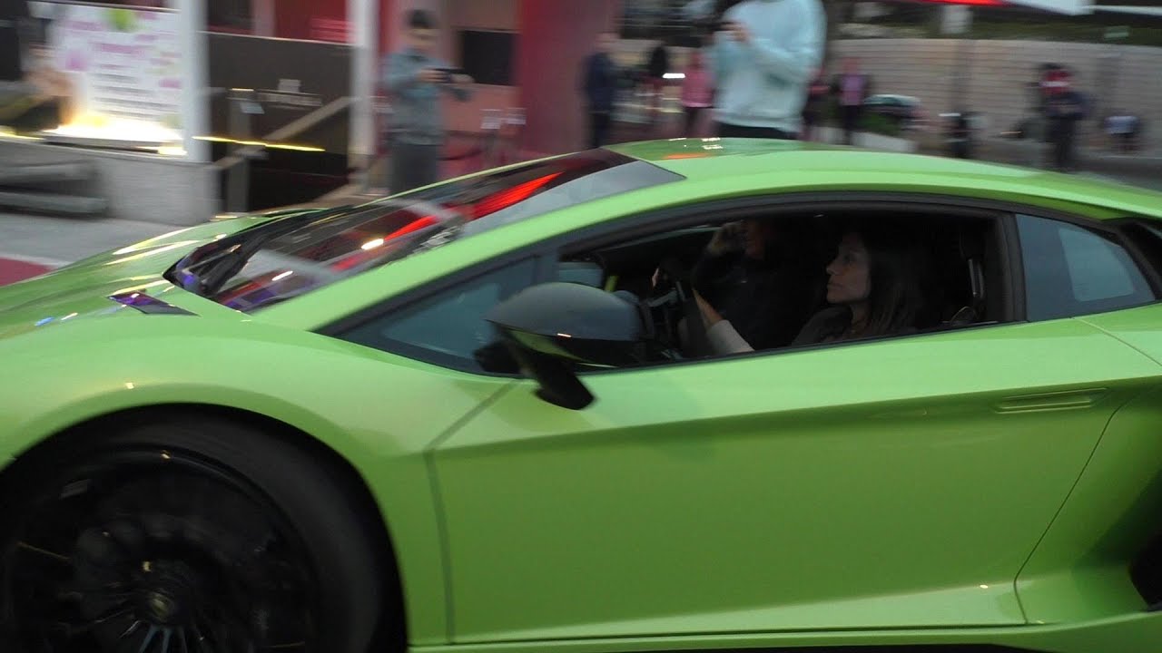 Hot girl driving a Lamborghini Aventador SV in Monaco