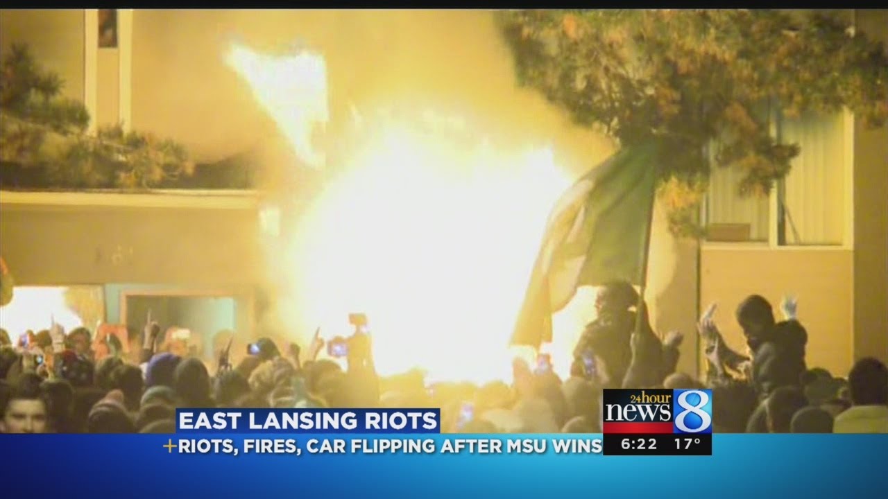 Car flipped over, fires near MSU campus