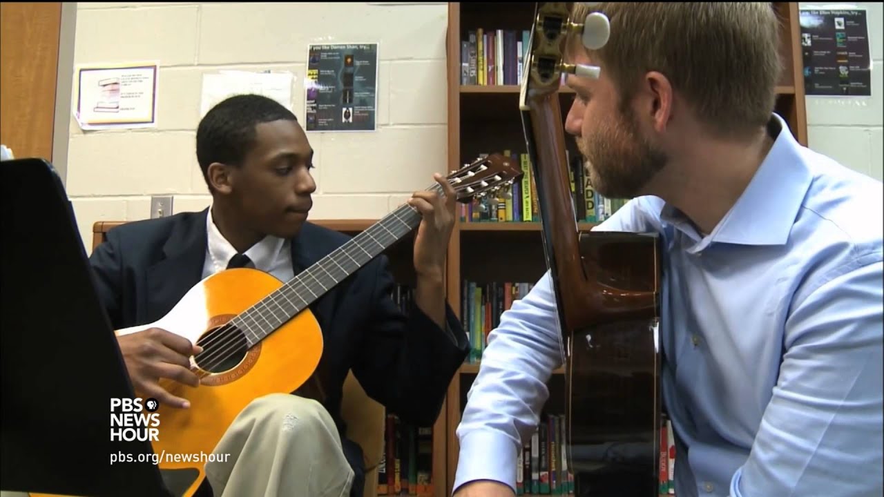 Learning classical guitar helps kids in trouble change their tune