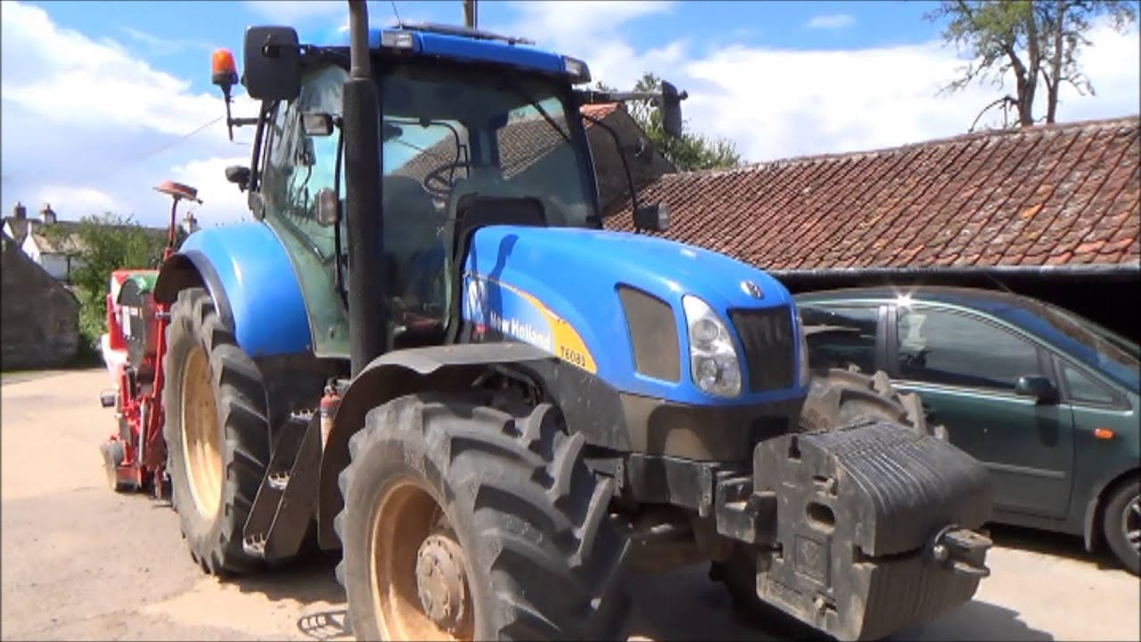 Drilling Maize (corn) seed.Loading the drill