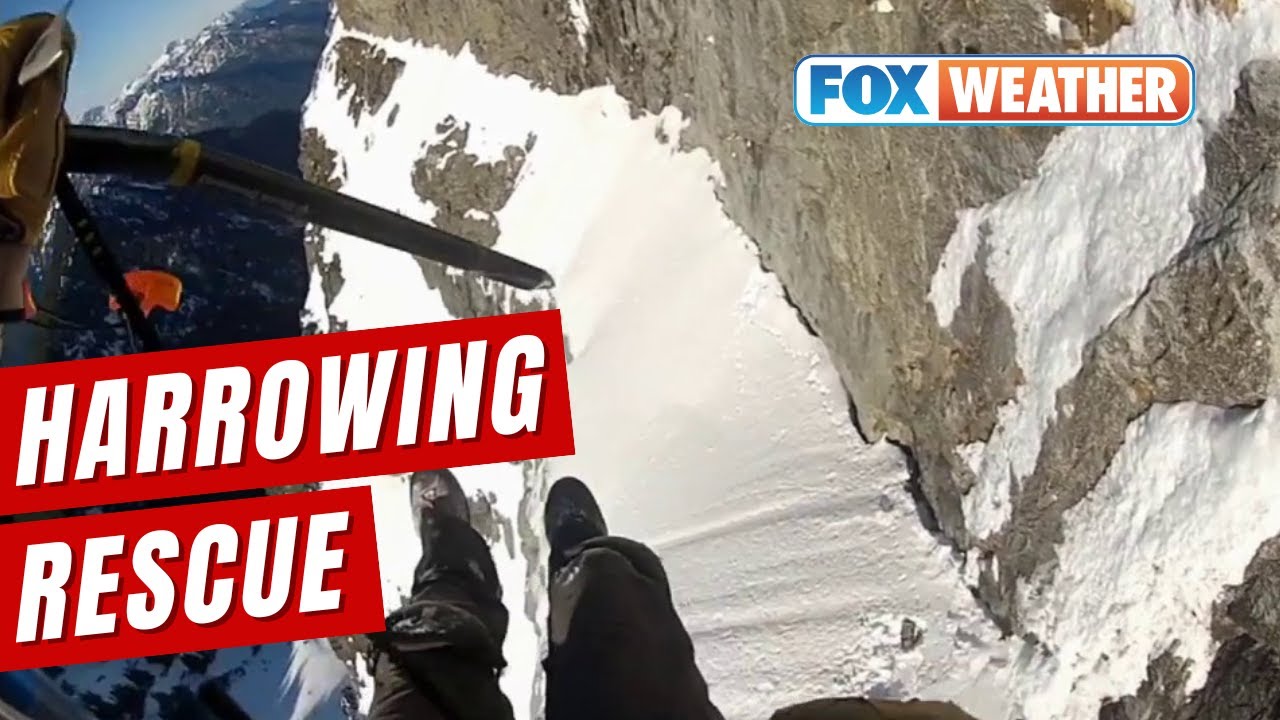 First-Person View Of Daring Helicopter Rescue Off Icy Mountain