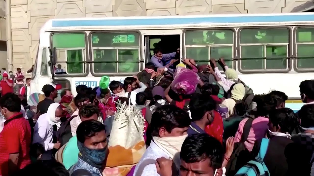 Coronavirus: Huge crowds as India lockdown prompts mass migration