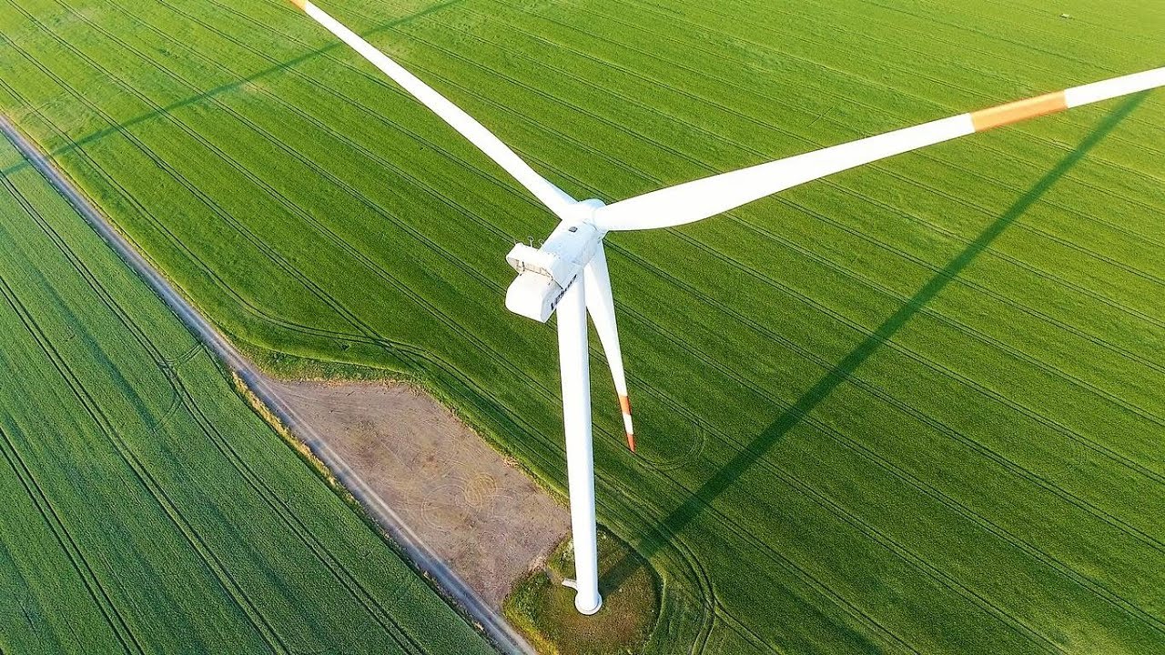 Wind farm Danna with Enercon and Vestas wind turbines from the air plus sunset