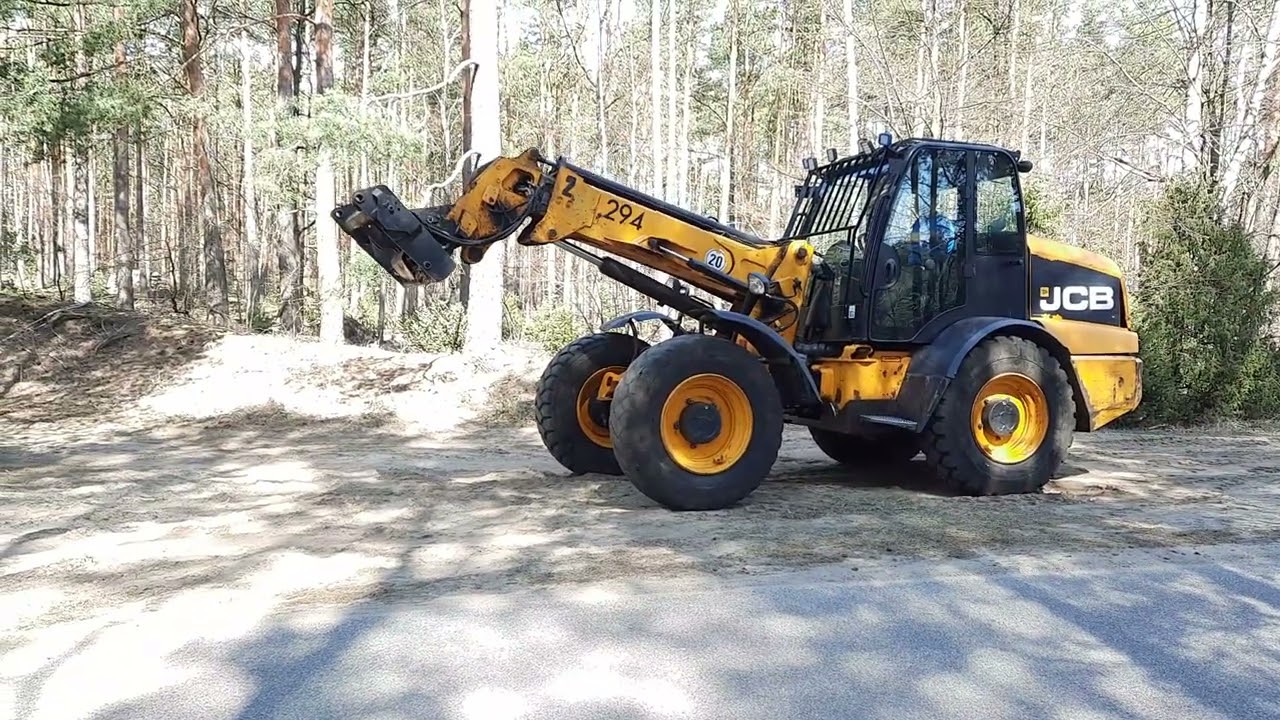 Ładowarka teleskopowa przegubowa JCB TM 320 + łyżko krokodyl, widły na aukcji Flotilo.pl 1 z 2