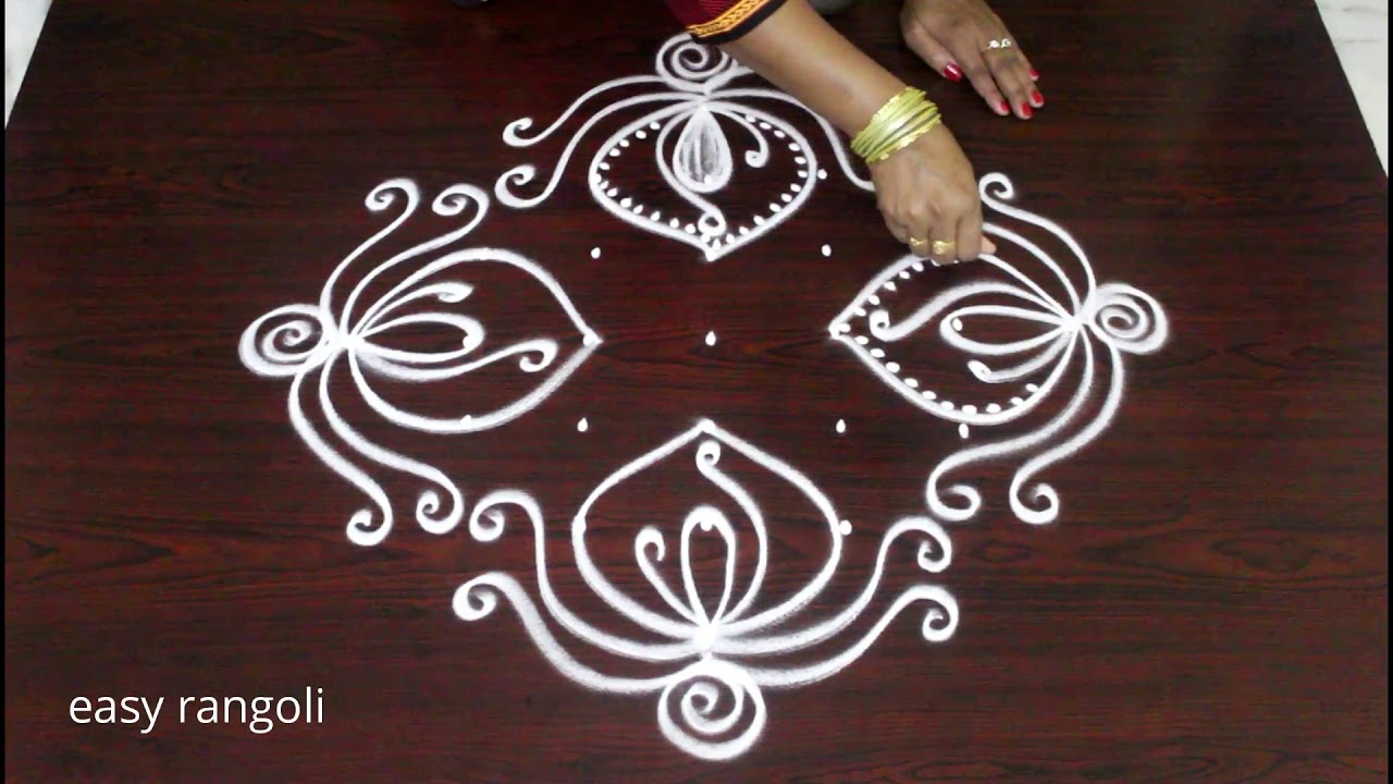 latest easy kolam with 7 dots * simple rangoli & new muggulu designs by Suneetha