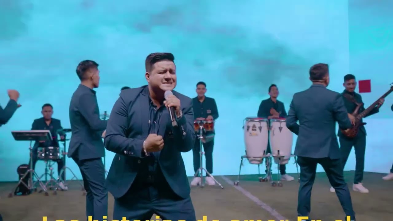 PARTIDO EN DOS LETRA  - LA UNICA TROPICAL