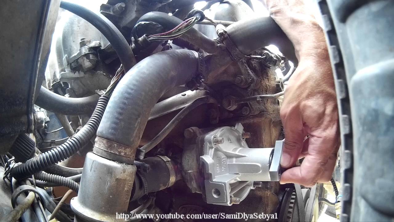 Car Repair. Water Pump Replacement SUV . How To Install Replace Water Pump Car Lada Niva 4x4 2-s