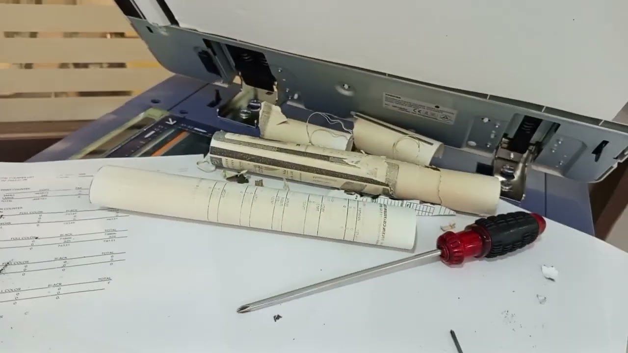 How to remove and cleaned rolled paper at fusing unit of Toshiba 456 model#repair#copiers 