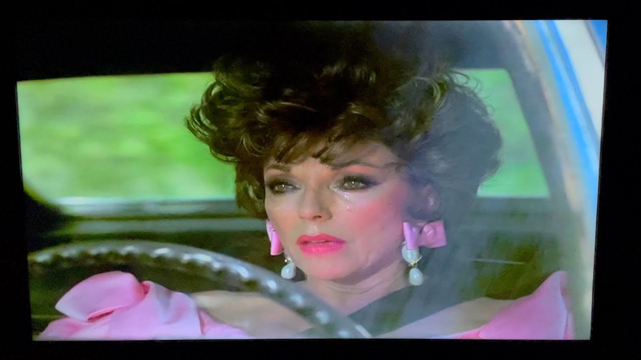 Dynasty: Alexis drives off a bridge.
