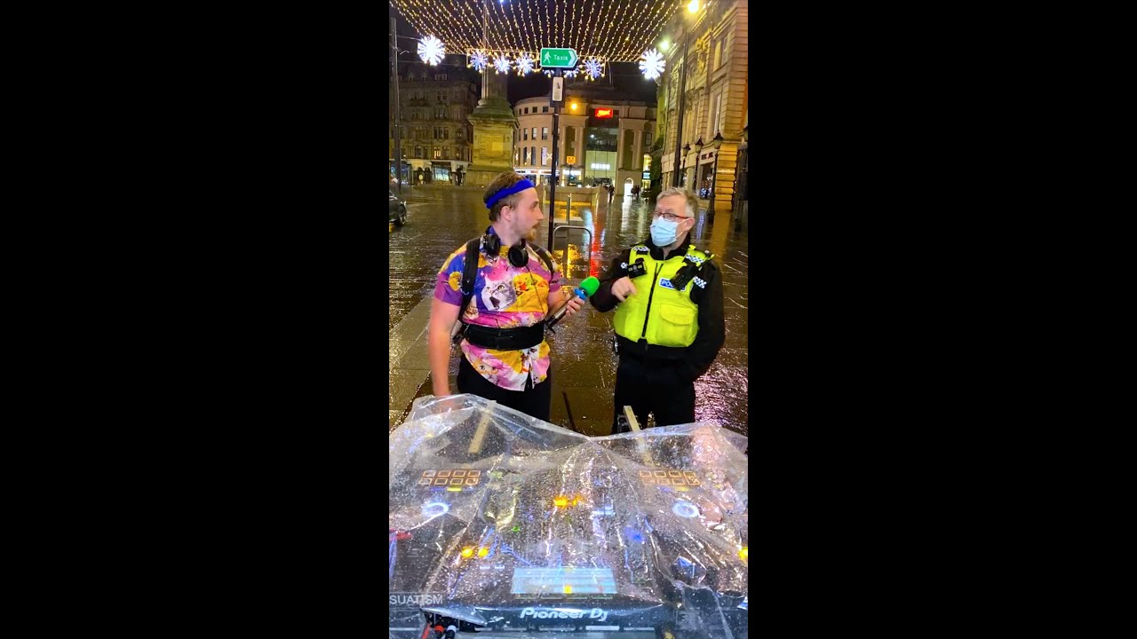 Mobile DJ hosts STREET PARTY in the RAIN...