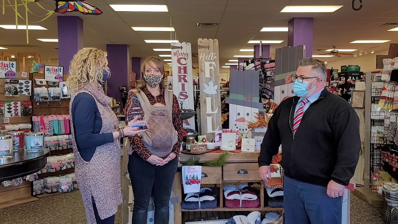 Sugar Bowl Gift Shop Accepts SLU Award