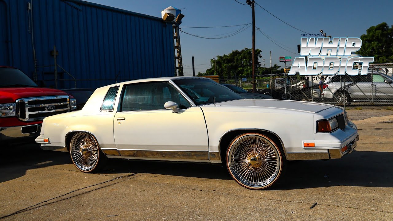 WhipAddict: Todd's Pearl White 87' Oldsmobile Cutlass on Spokes! Custom Trunk by  Street Sin Design
