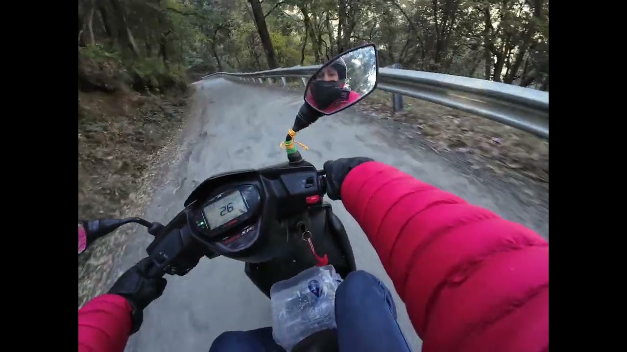 Riding scooter in Himalayas 
