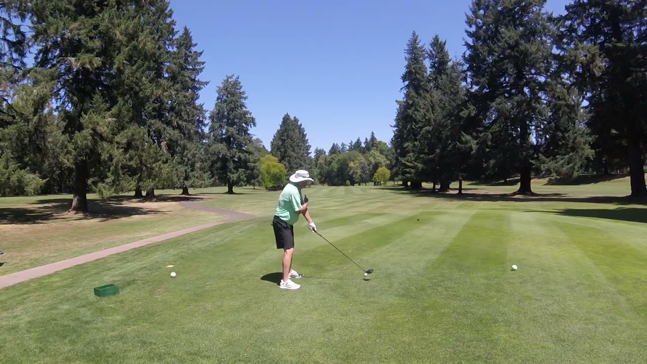 Driving - Behind view, mix of Scheffler grip and Dechambeau arms