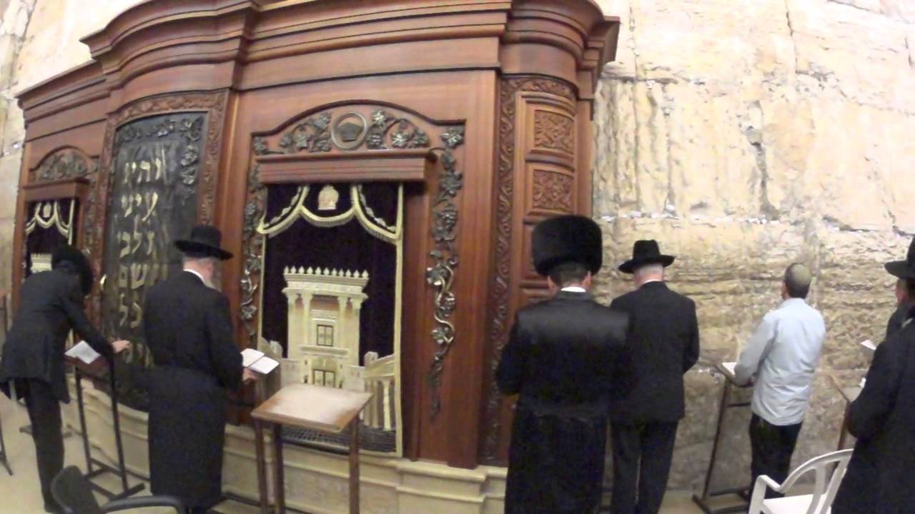 A Hasidic Jews praying at the synagogue of the Western Wall, Jerusalem an hour before Saturday