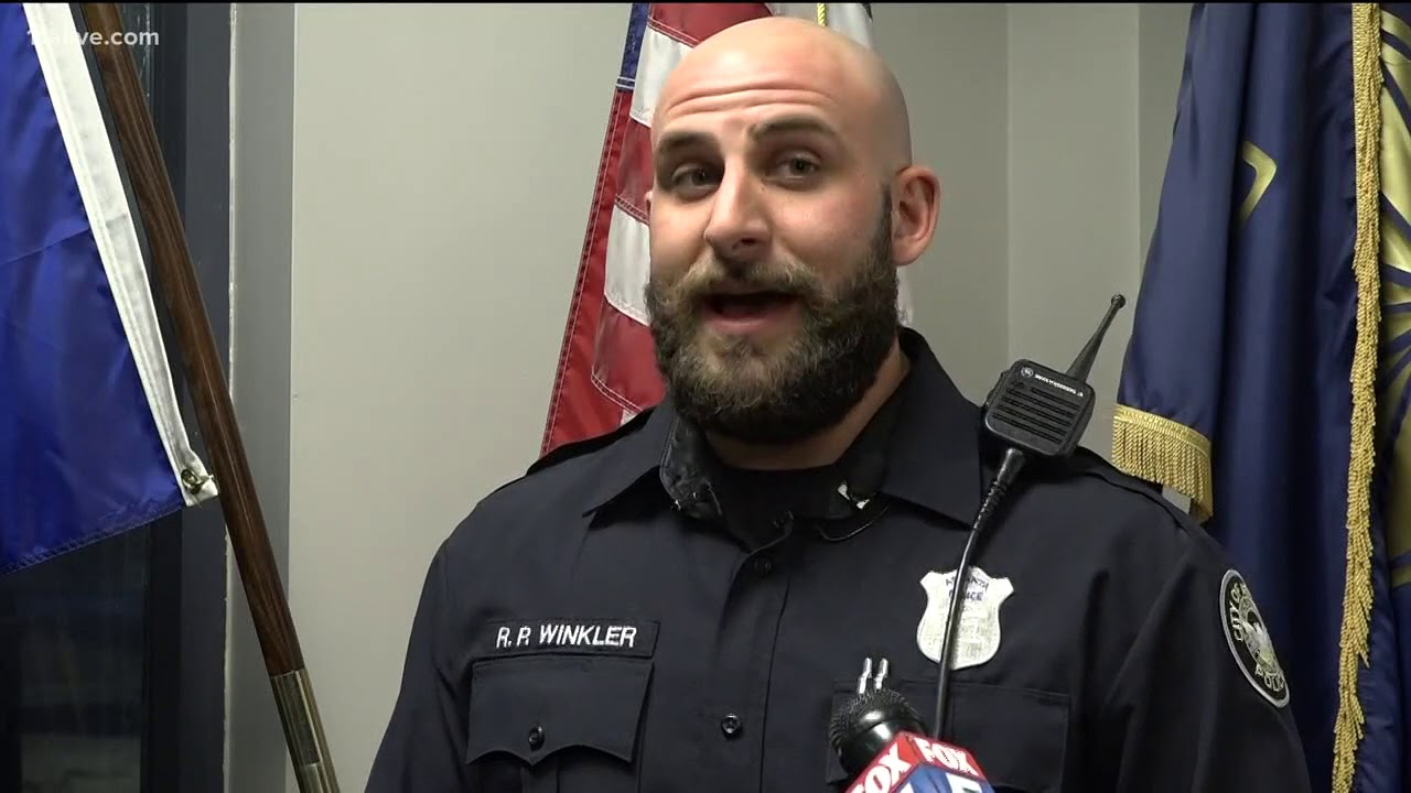 Atlanta police officers rush into burning building to save dog