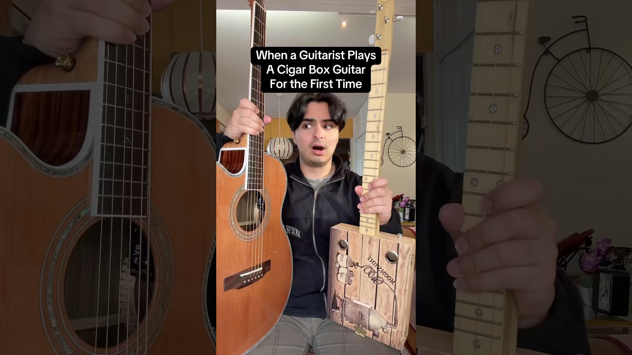 When a guitarists plays a cigar box guitar for the first time
