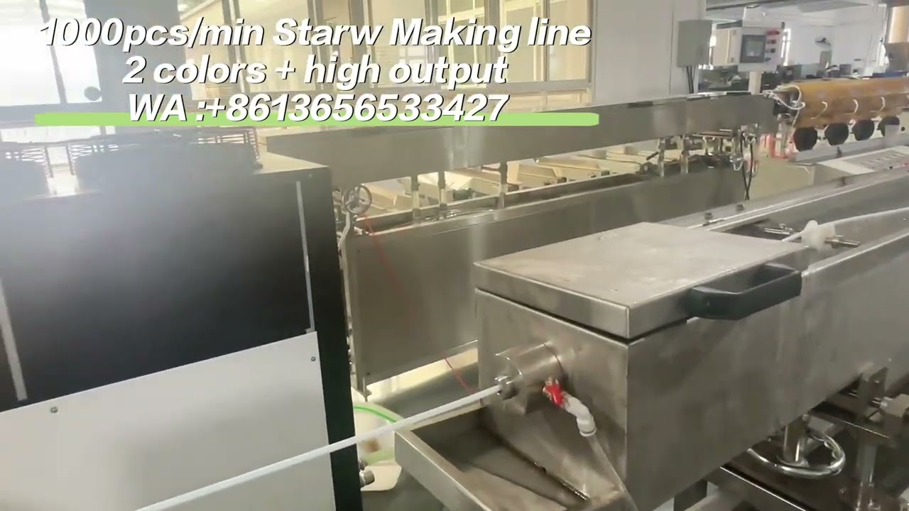 2 color automatic straw extruder —Where red and white pass each other in millimeter-scale channels.