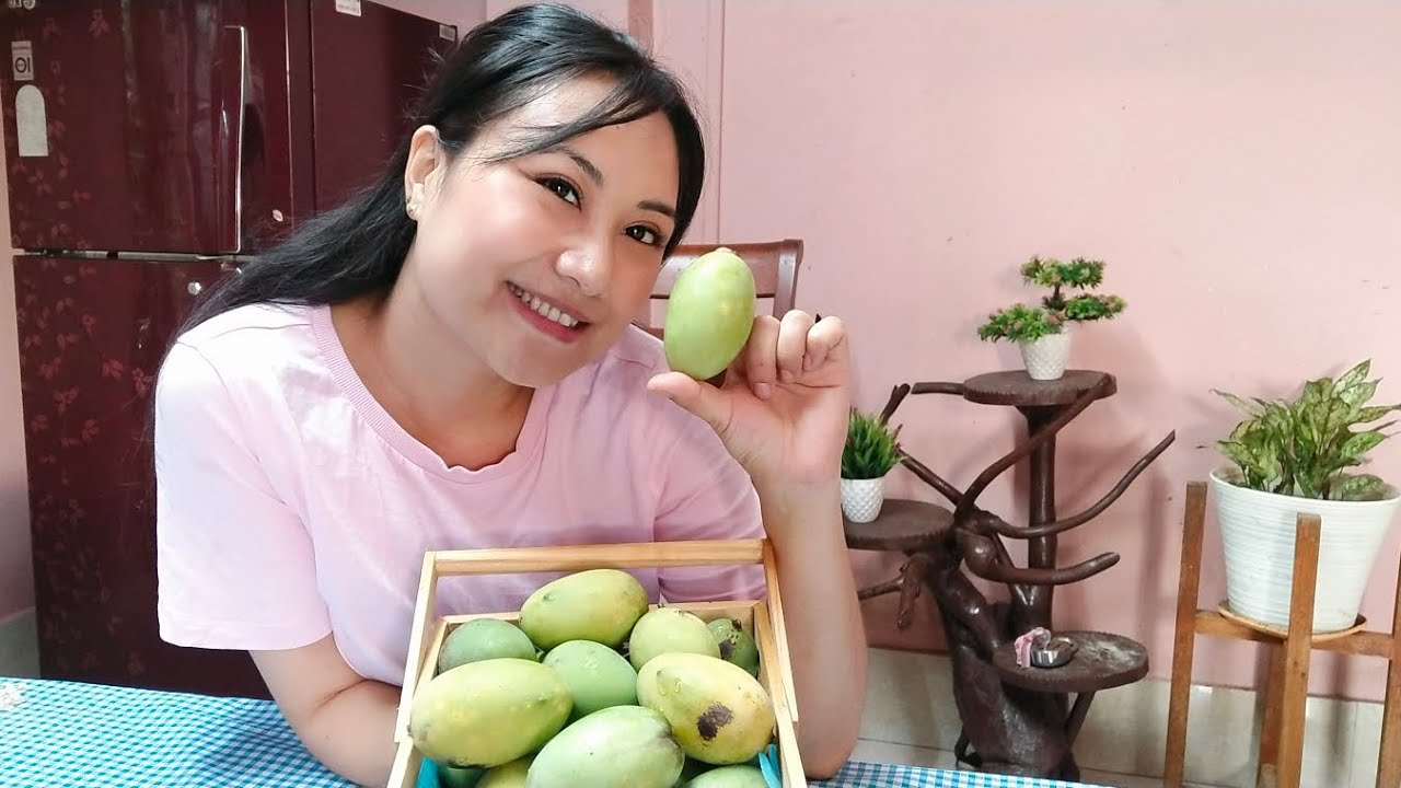 Plucking and eating home grown mangoes 🥭 | mango season|