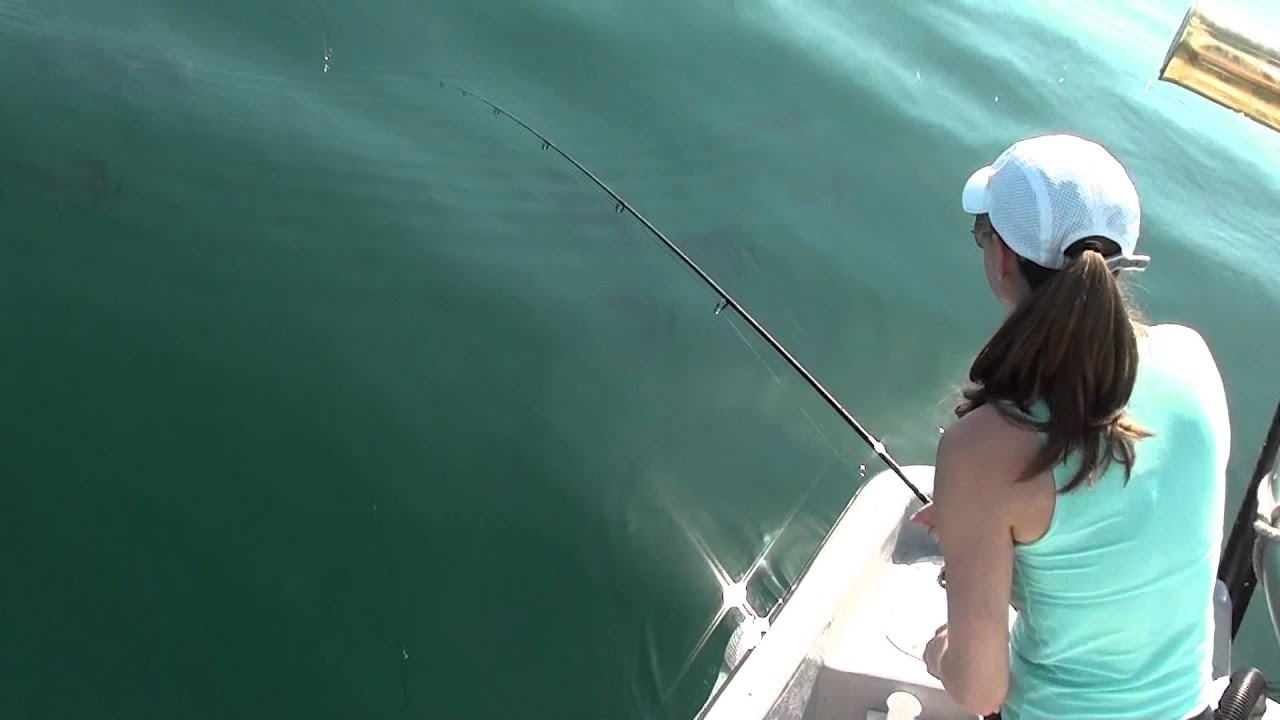 Shauna fights a spadefish with Capt Ben Floyd Isle of Palms Fishing