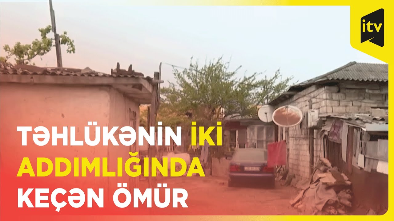 Dəmir yolu relslərinin iki addımlığında yaşayan sakinlər