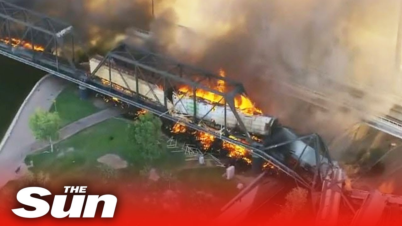 Freight train derails and bursts into flames in Arizona causing bridge collapse