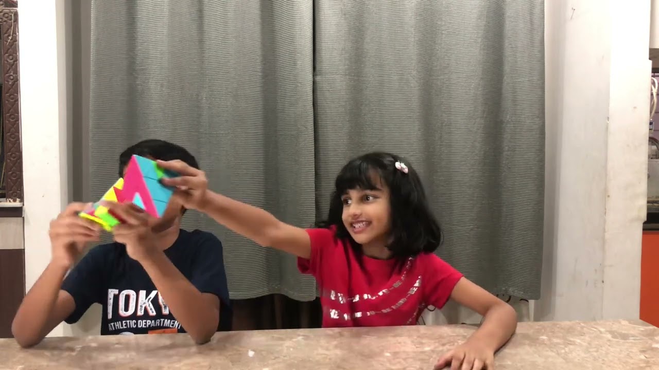 How to solve pyraminx cube |brother and sister challenge @soumyakommula