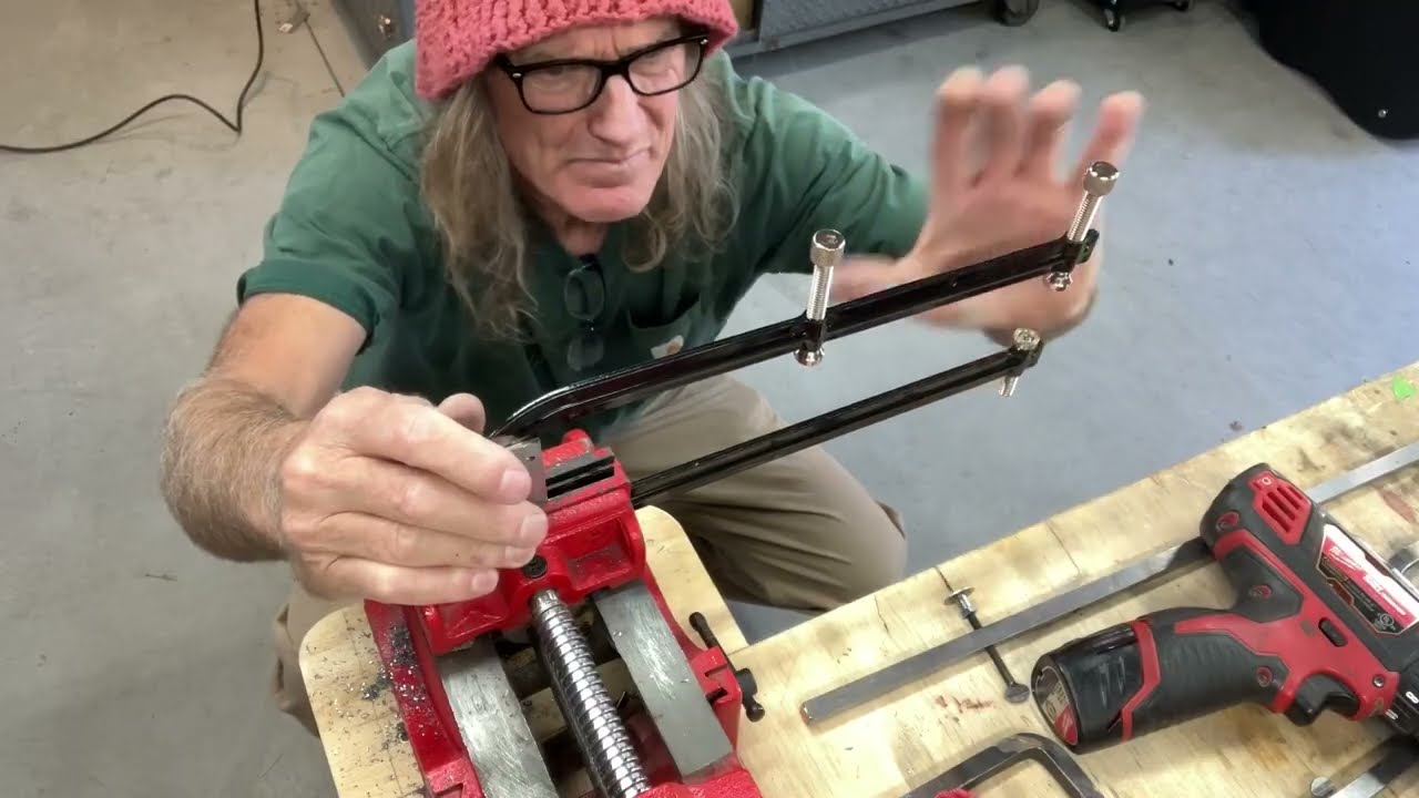 Fabricating a split sound hole clamp for guitar repair.
