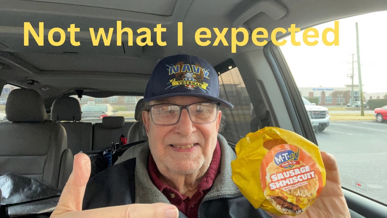 Not so happy with the Sheetz sausage , egg, cheese on a burnt biscuit 