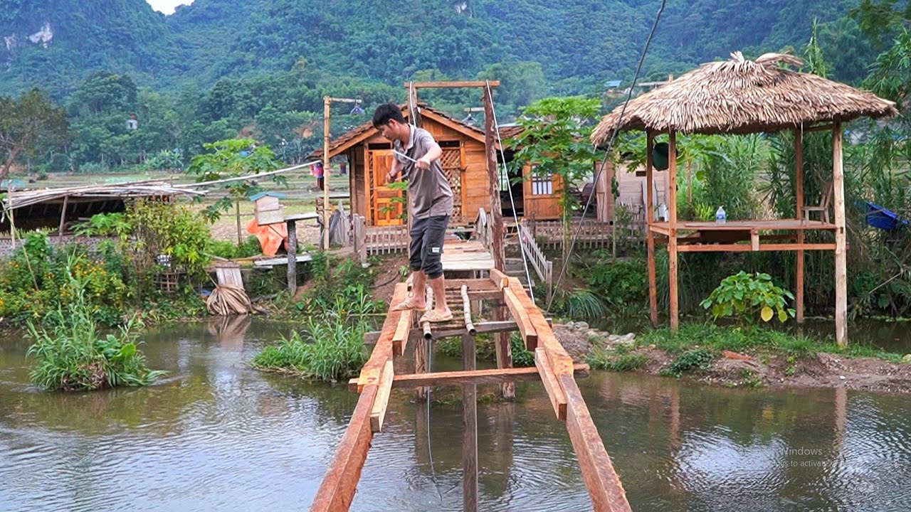 Construction progress of the suspension bridge on day 5.Stretch the cables and build the bridge span