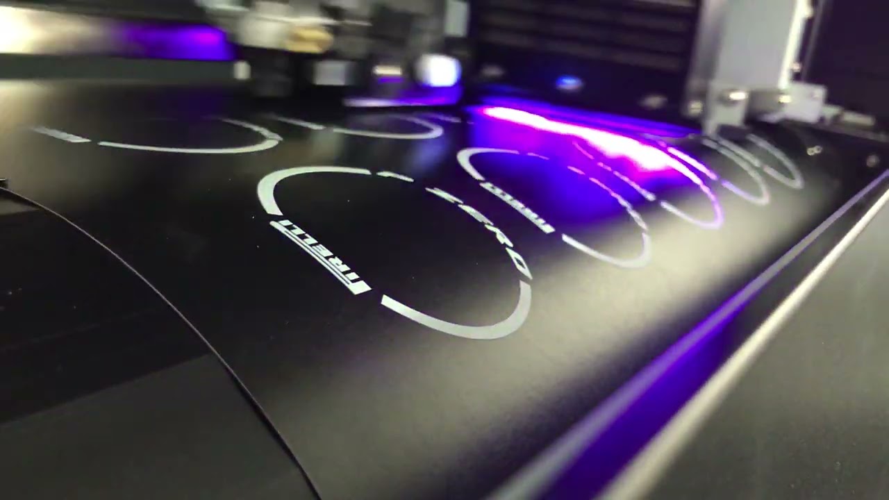 Roland's new UV printer - the MG300 printing white ink on matt black vinyl HIGH OPACITY,