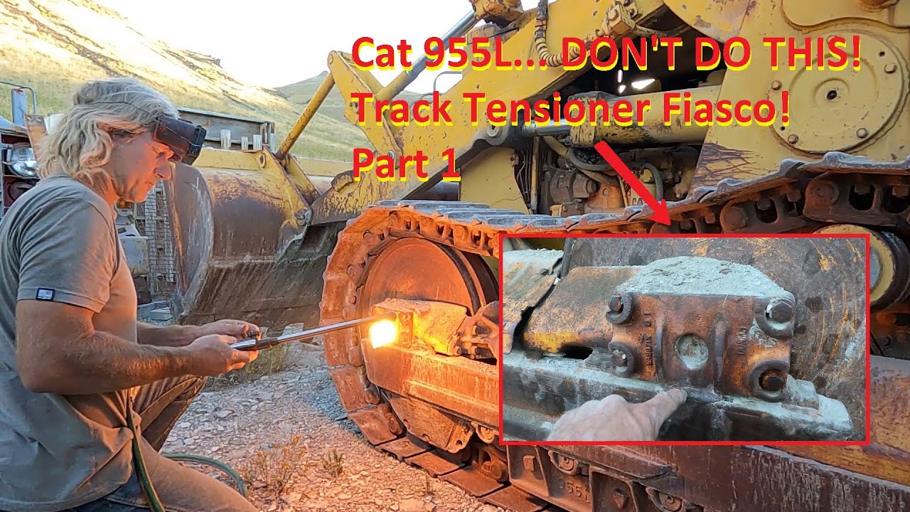 Cat 955L, НЕ ДЕЛАЙТЕ ЭТОГО! Поломка натяжителя гусеницы! Часть 1