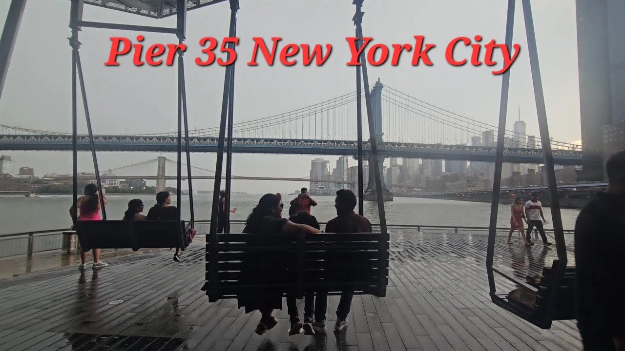 A swing with a view of the Manhattan Bridge KefamC 