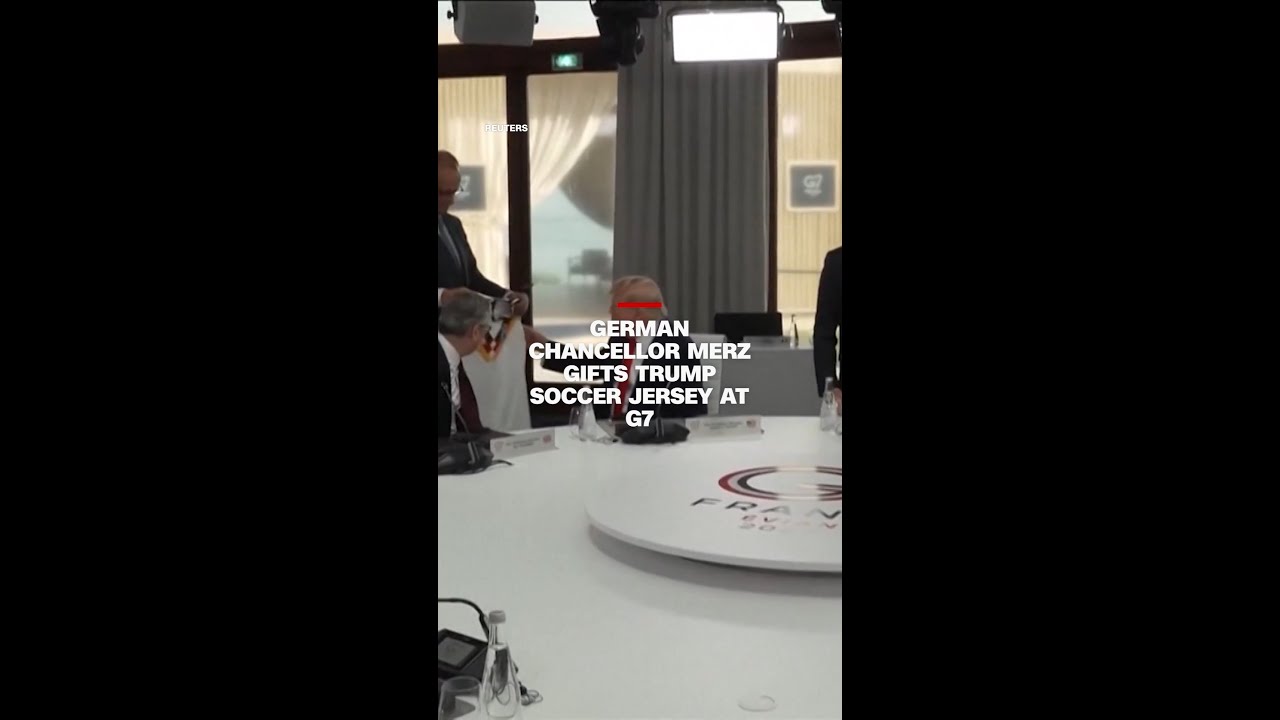 German Chancellor Merz gifts Trump soccer jersey at G7