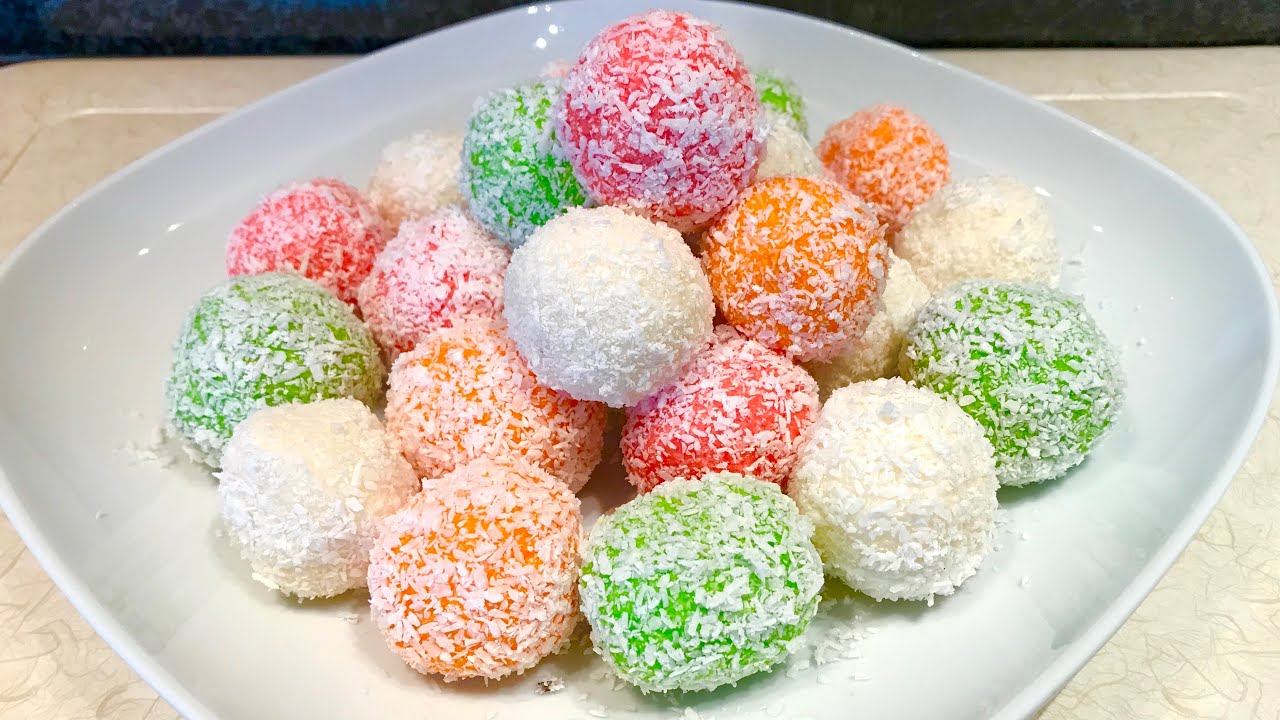 Coconut candy balls | How to make coconut candy balls the easiest way | Raffeallo coconut balls .