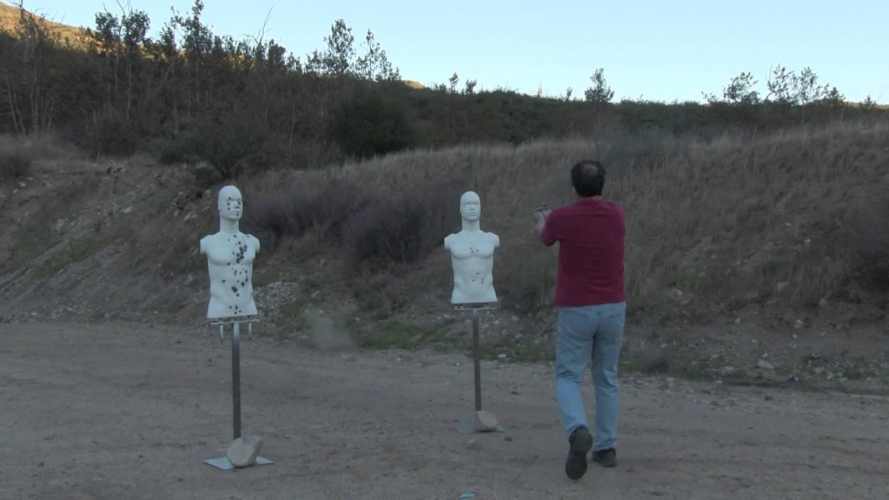Rubber Dummy shot at with a 45ACP, 2 targets