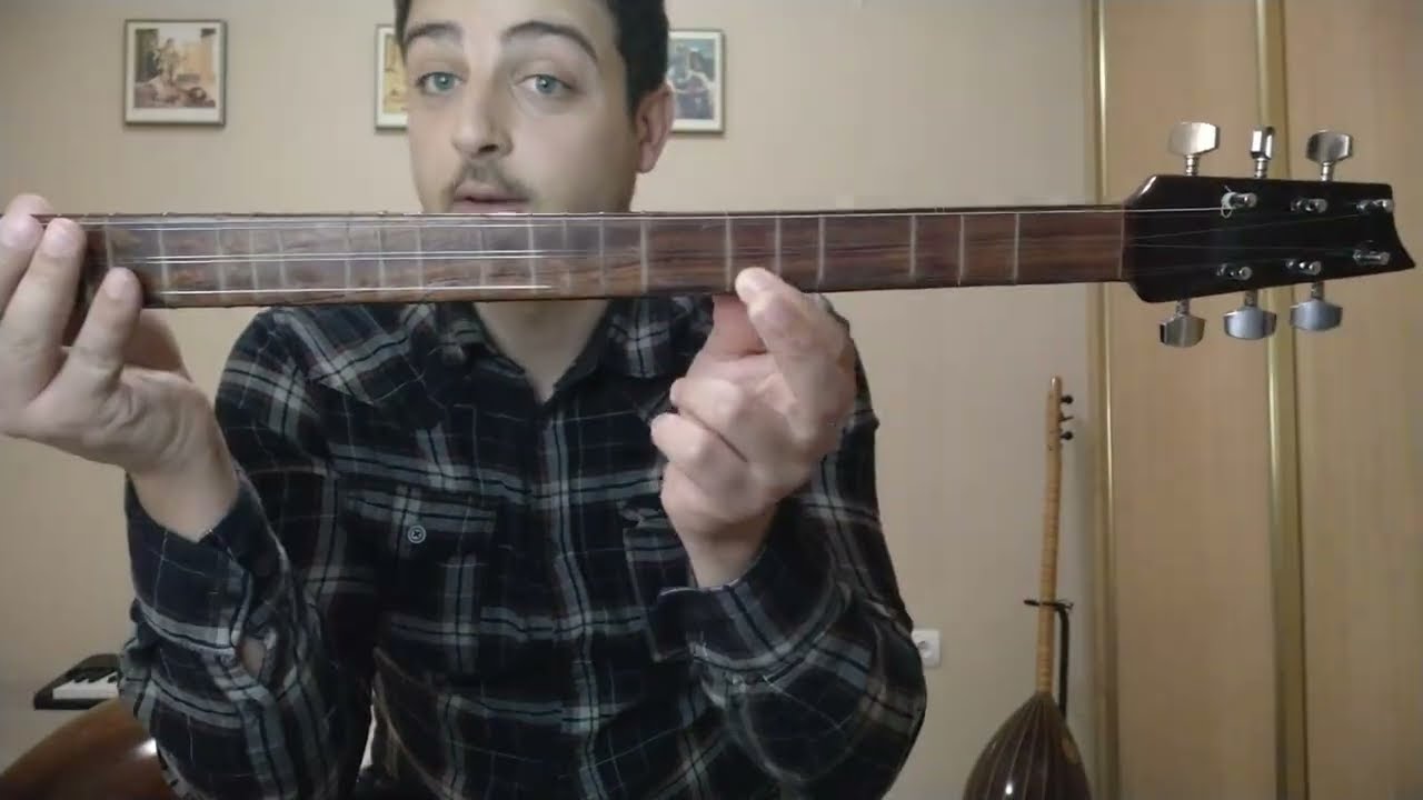 The first lesson to learn how to play Buzuq instrument